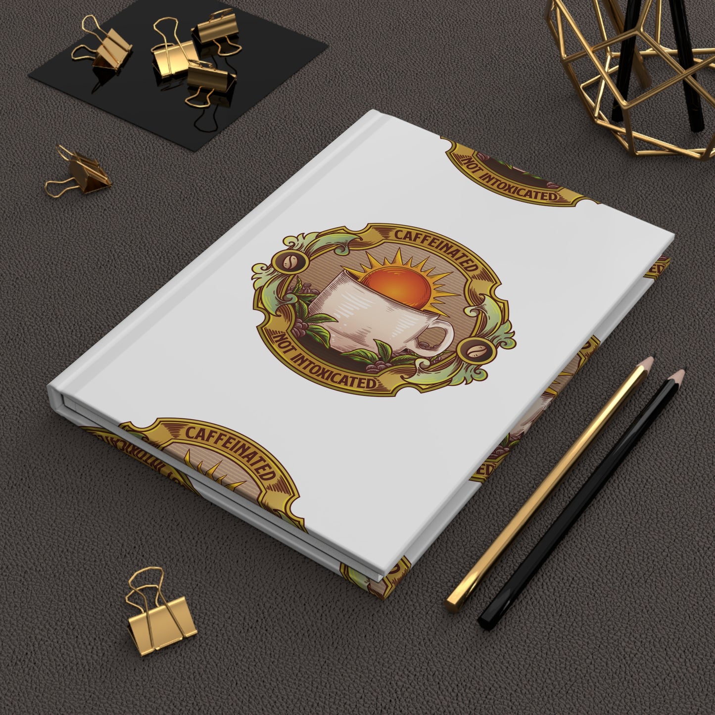 Caffeinated Not Intoxicated hardcover journal with matte finish on dark background