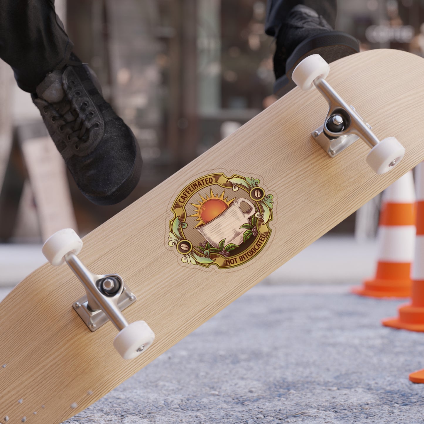 Caffeinated Not Intoxicated recovery sticker applied to skateboard deck